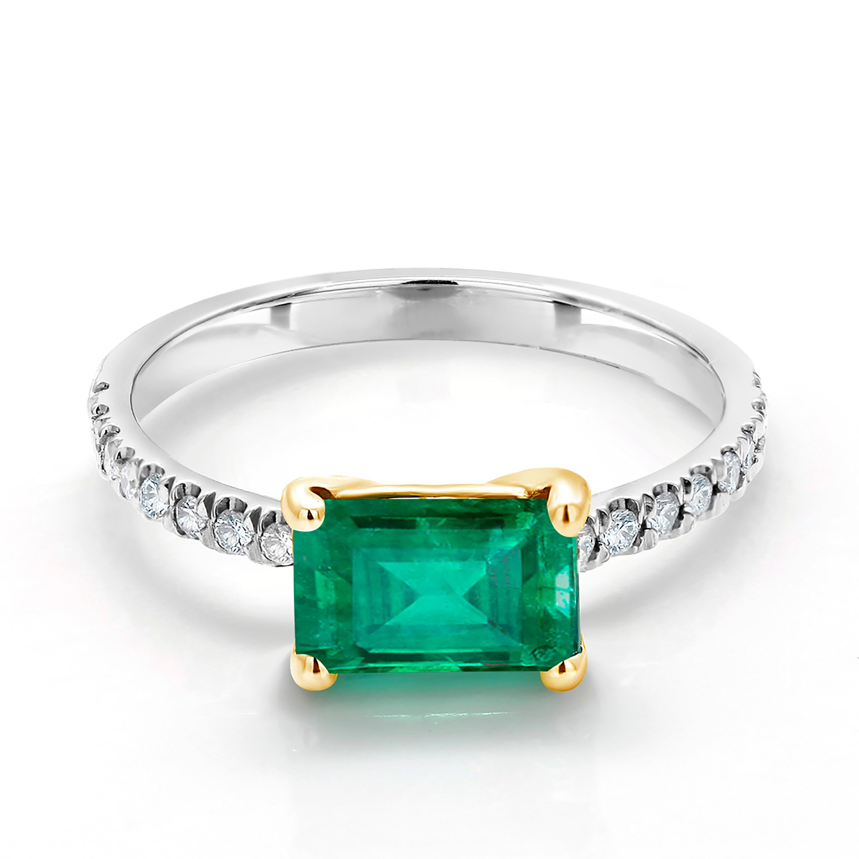 Eighteen karats yellow and white gold emerald and diamond cocktail ring 
Eighteen diamond weighing 0.40 carats
Columbia green emerald cut emerald weighing 1.30 carats
Emerald tone color is emerald green 
Ring finger size 7
Emerald measuring 9x7