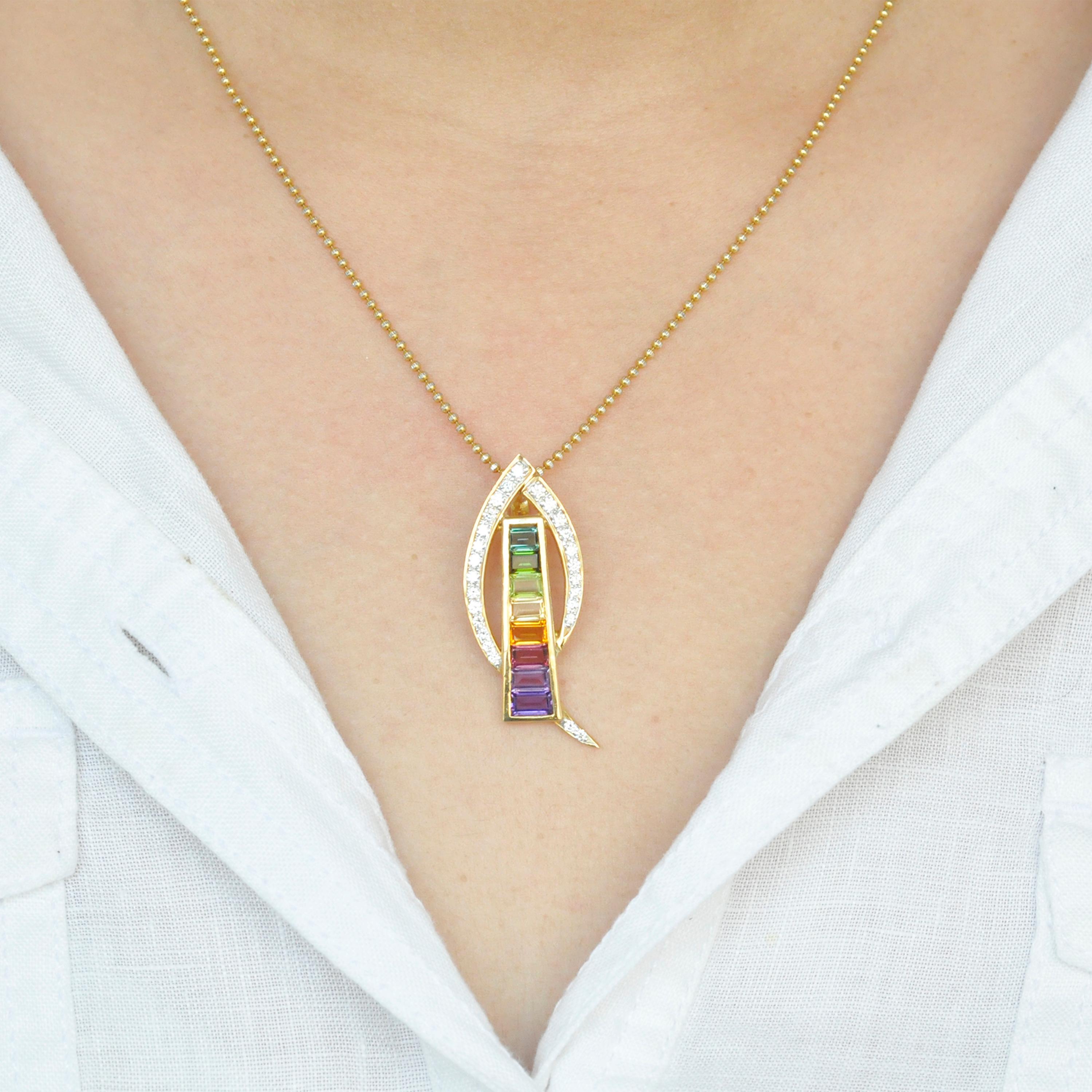 18 karat gold contemporary rainbow multicolor gemstone diamond pendant necklace

This elegant chic multicolor rainbow pendant is made in 18 karat yellow gold. The beauty of this pendant lies in the simplicity yet the piece is made with international