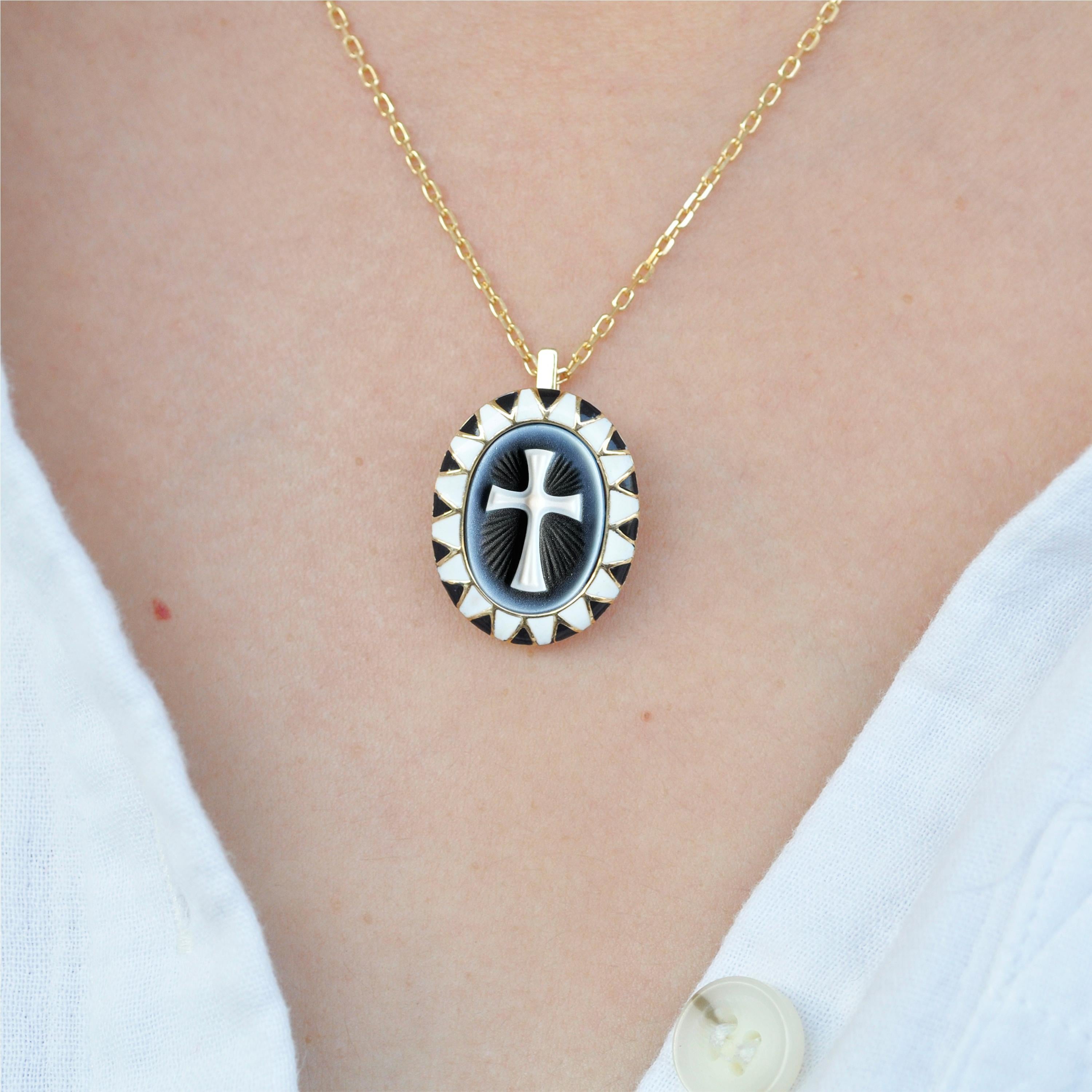 18 karat gold cross agate cameo black white enamel pendant

This cross cameo can be set in 18 karat gold carved by our master german engraver on the relief of a natural agate gemstone. The size of the cameo is 18x13 mm oval which is a good size. You