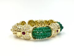 18 Karat Gold Cuff Bracelet with Emeralds, Diamonds and Rubies