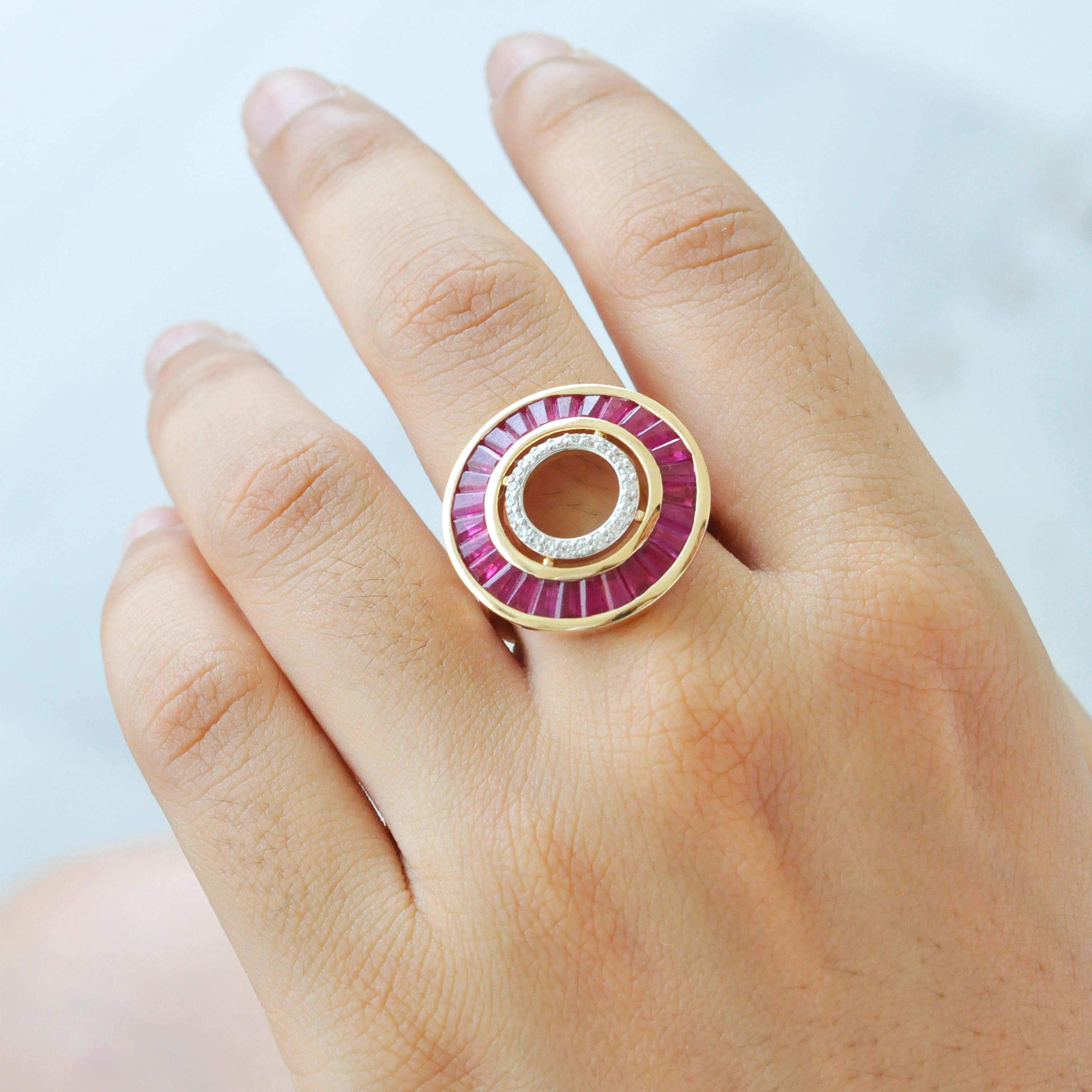 18 karat gold custom cut burma ruby baguette diamond art deco circular ring.

Art Deco Style, color and culture all come together to inspire this beautiful 18 karat gold taper baguette cut ruby diamond circular ring, where sumptuous scarlet of