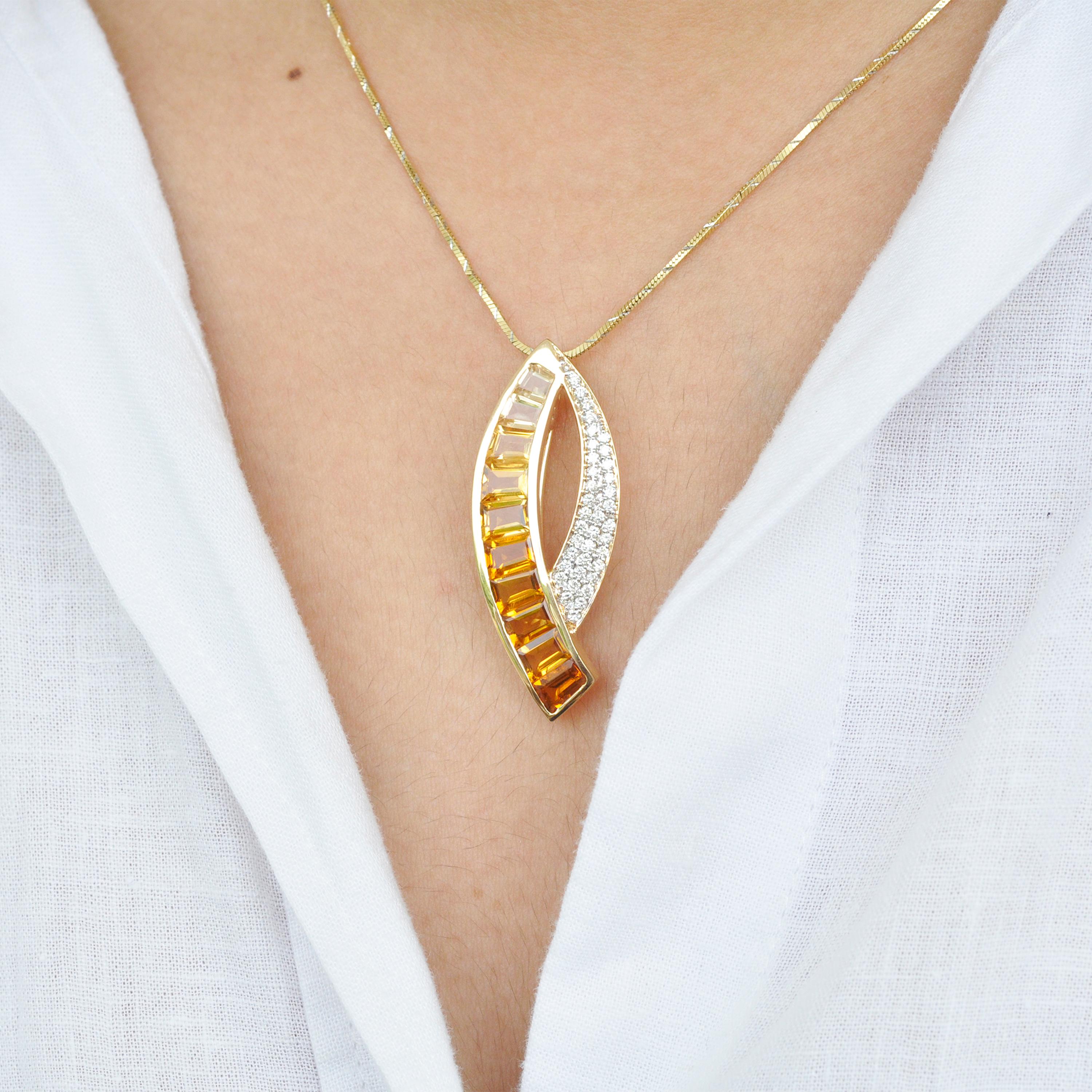 18 karat gold custom cut gradient taper baguette citrine diamond pendant brooch.

This glorious yellow citrine pendant brooch depicts an exemplary play of shades of lustrous citrines. The shape of this extraordinary pendant brooch has an