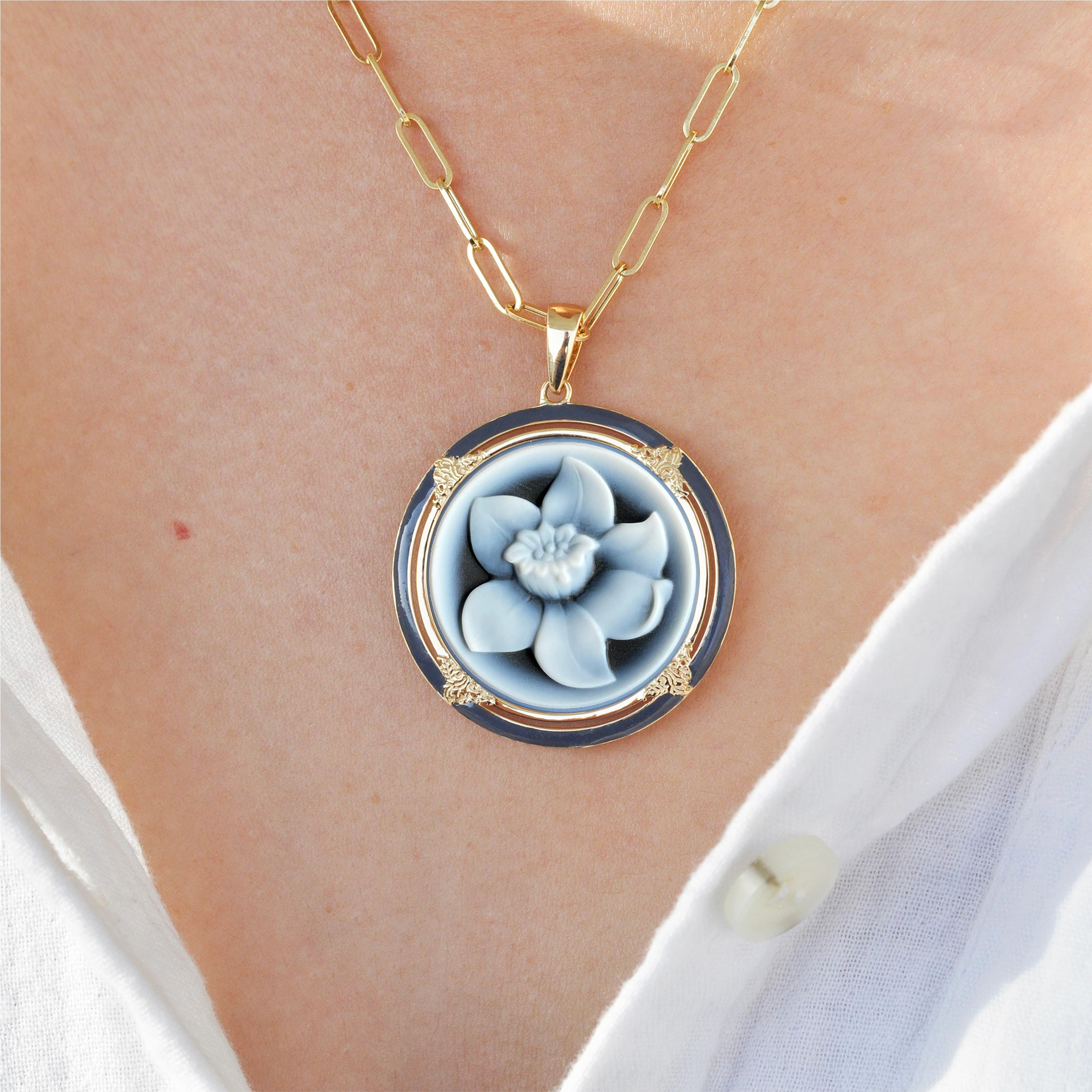 18 karat gold daffodil flower agate cameo enamel pendant

The cameo can be set in 18 karat gold featuring the daffodil cameo carved by our master german engraver on the relief of a natural agate gemstone. The size of the cameo is 24mm round which is