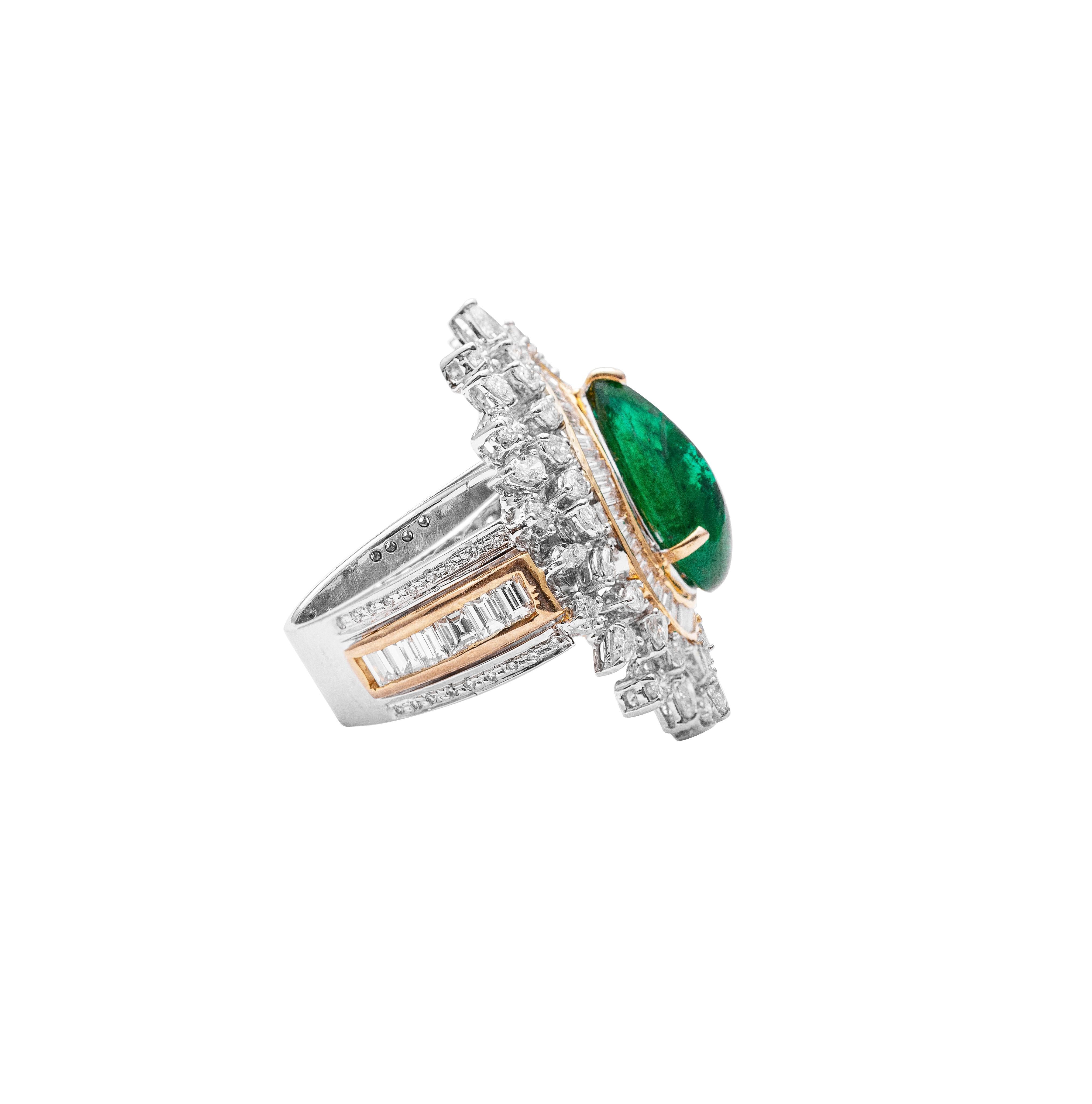 18 Karat Gold Diamond and Emerald Cocktail Ring 

Beautiful diamond & emerald cocktail ring set in 18 Karat gold, studded with white diamonds and a beautiful emerald cabachon.

Gold - 21.076gms
Diamond - 3.99 cts
Emerald - 5.13cts

