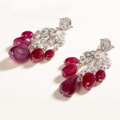 18 Karat Gold Diamond and Ruby Bheruṇḍa Earrings