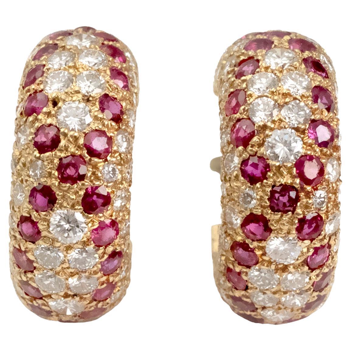 Orecchini in oro 18 carati con diamanti e rubini