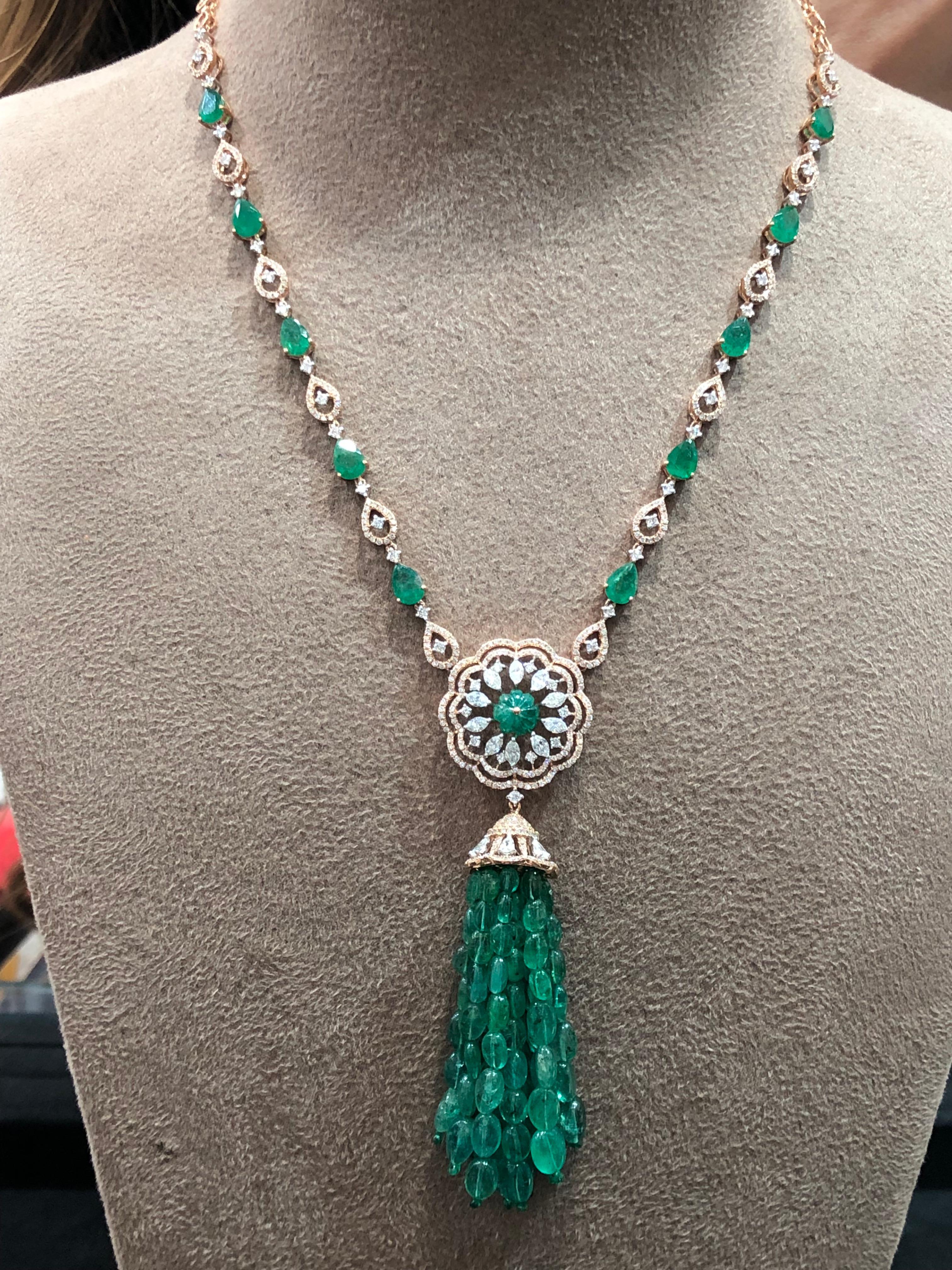 Diamonds: 3.52 carats
Emeralds: 68.31 carats
18kt Gold: 22.75 grams
Ref No: DPS-HA

Glamorous and feminine, the combination of the floral motif and delicate movement of emerald beads is sure to provide precious company from a romantic date to a