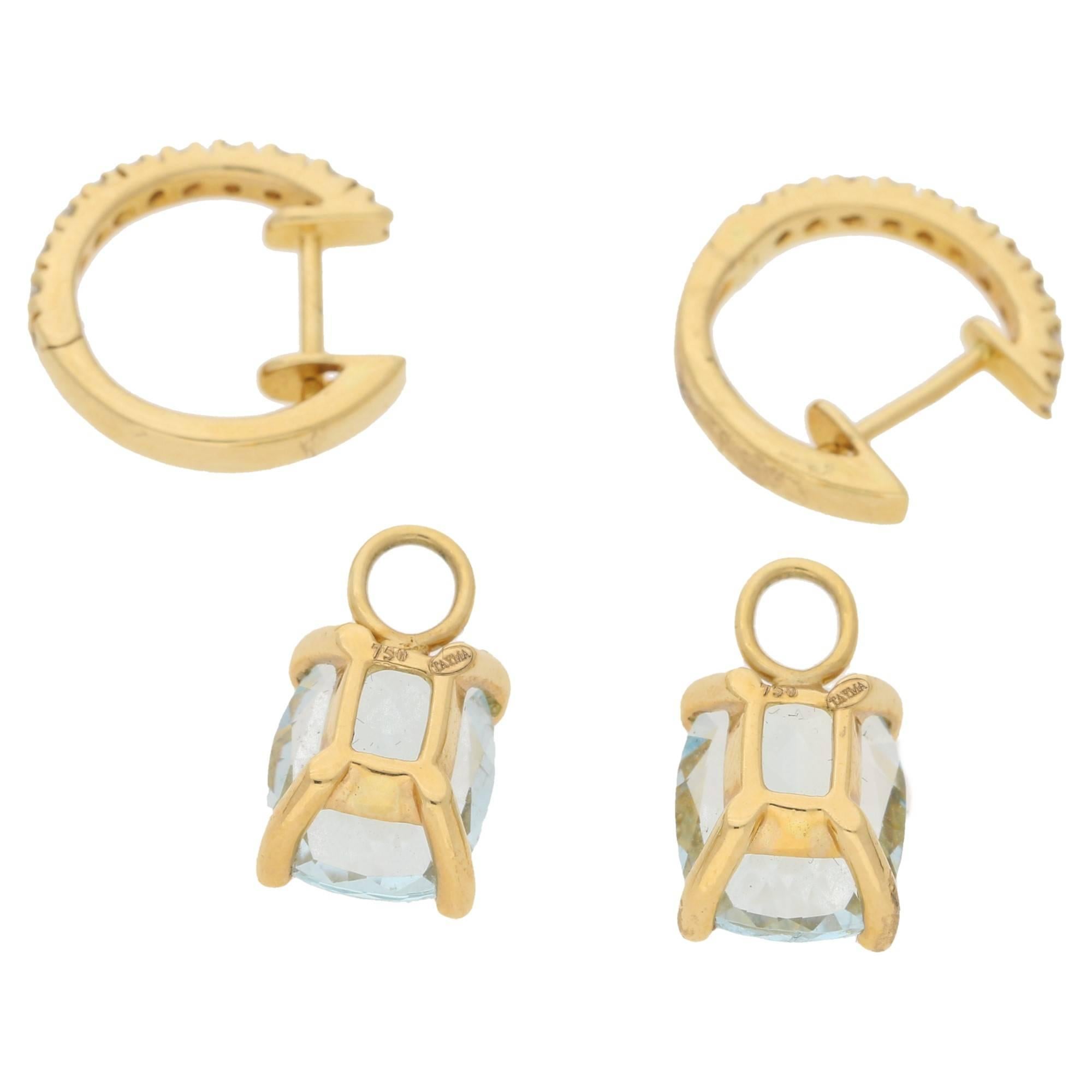 A pair of detachable diamond and aquamarine hoop drop earrings. The hoops are set with round brilliant diamonds, in rich 18k yellow gold. The aquamarines have a simple hook on mechanism, so can easily be taken on and off, once on they are very