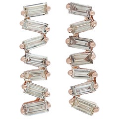 Clous d'oreilles baguettes en or 18 carats et diamants