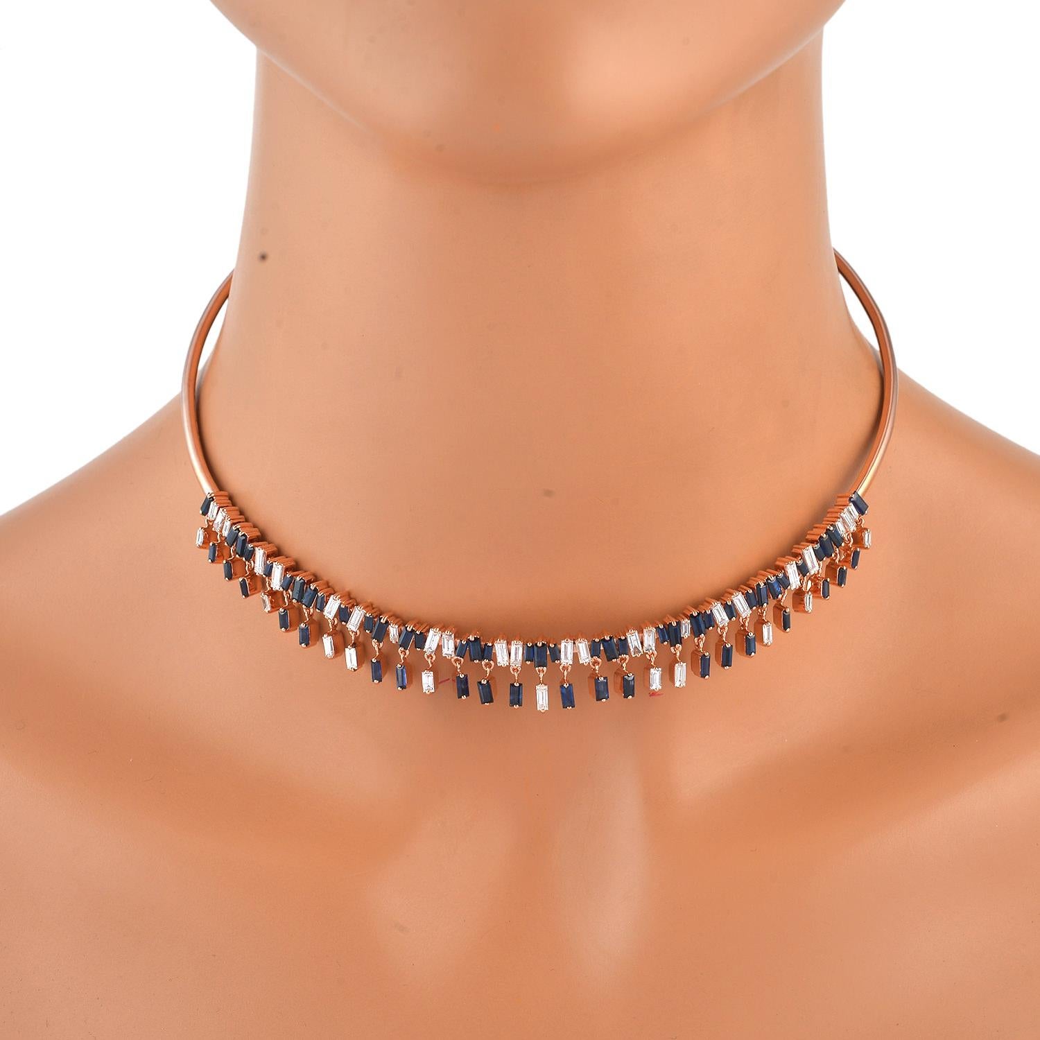 Cast in 14 karat gold, this stunning choker necklace is hand set in 6.49 carats baguette cut blue sapphire and 2.81 carats of diamonds. It is expertly placed in dangling settings. Available in yellow and white gold.

FOLLOW  MEGHNA JEWELS storefront