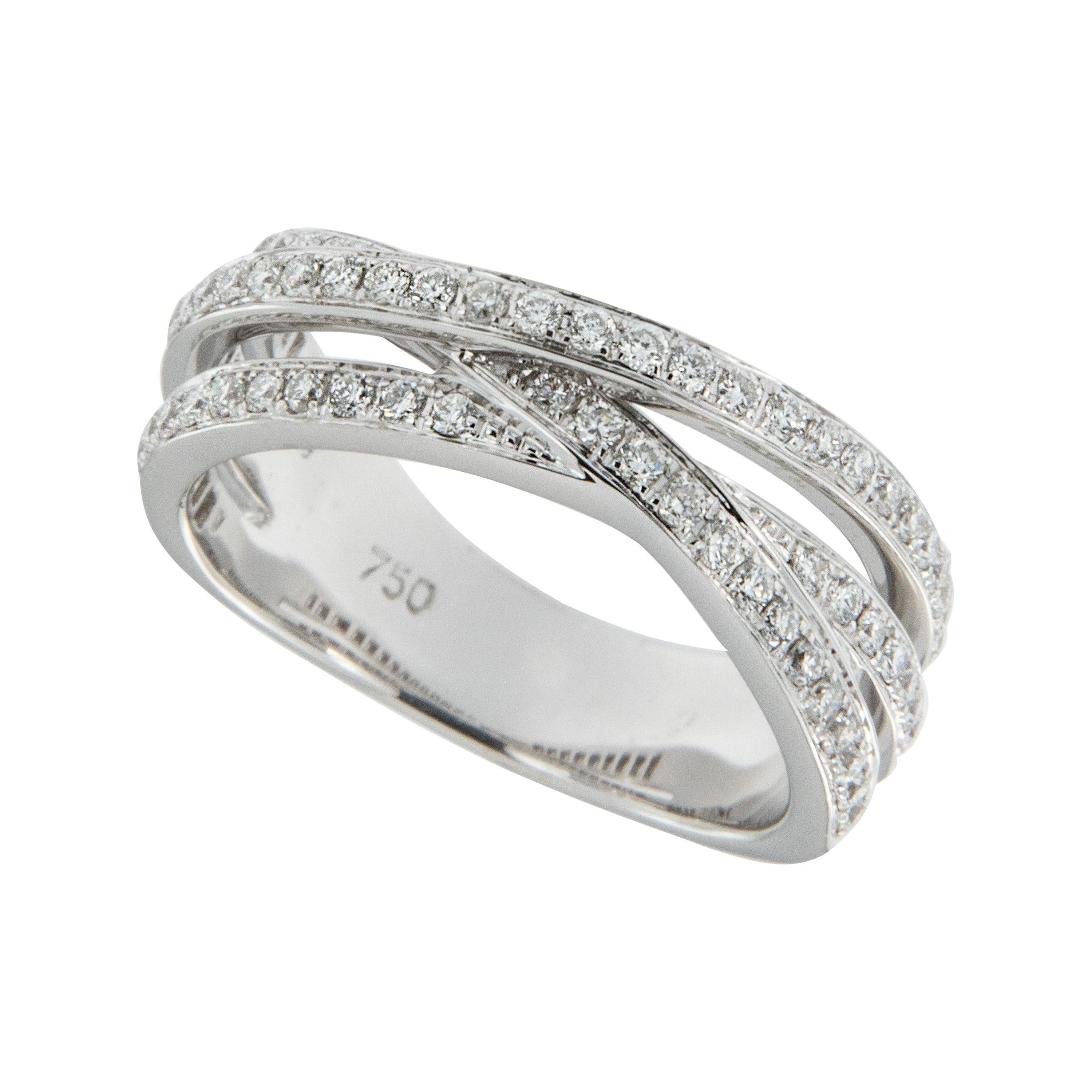 This three rowed crossover band is sure to please with 0.43 Cttw diamonds that can be worn as an anniversary band or as a right hand fashion ring. Made in Switzerland of fine 18 karat white gold in a size 4.5.
