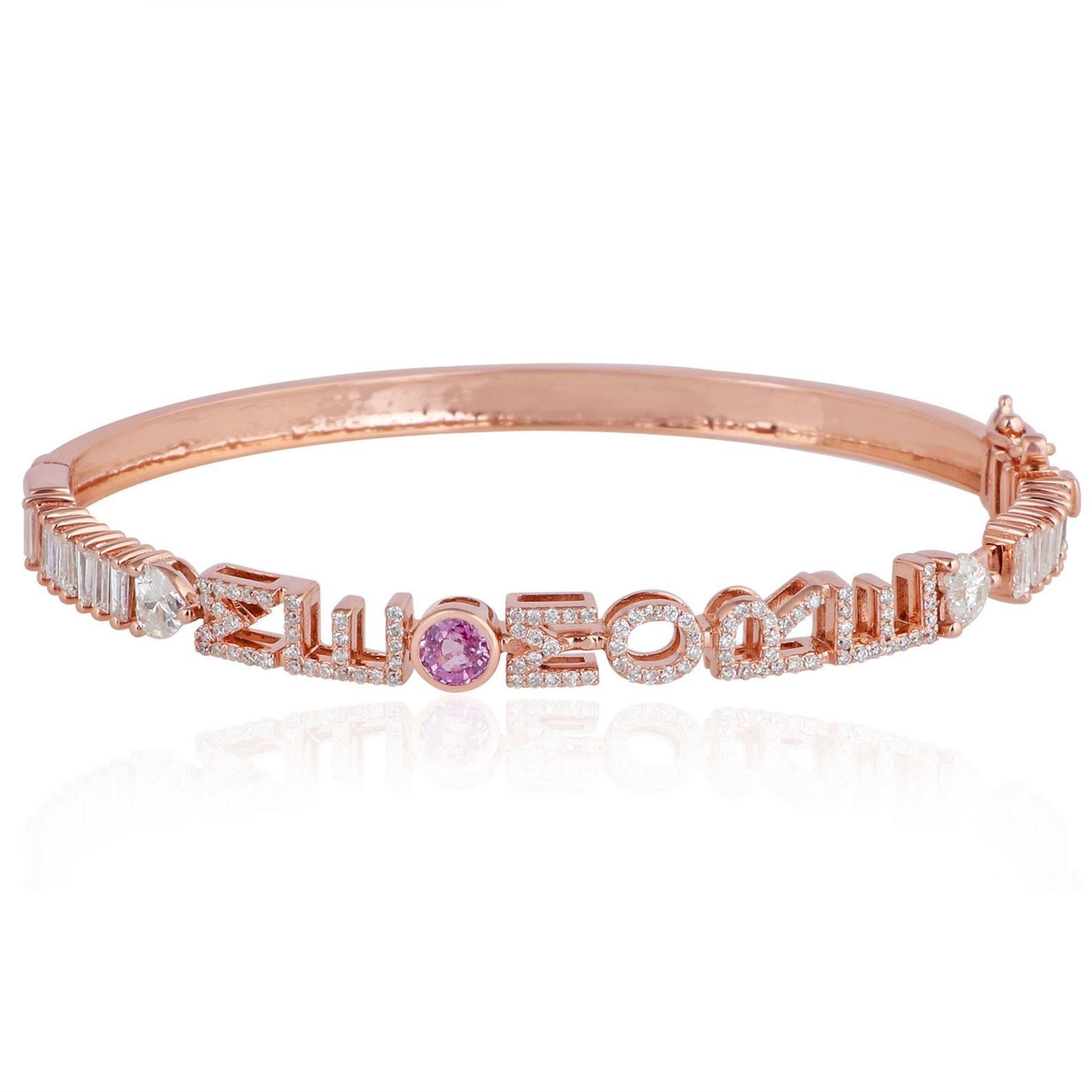 A stunning bangle bracelet handmade in 14K gold. It is hand set in .40 carats sapphire and 1.21 carats of sparkling diamonds. Wear it alone or stack it with your favorite pieces.  Please specify your custom name or initials at time of order.

FOLLOW