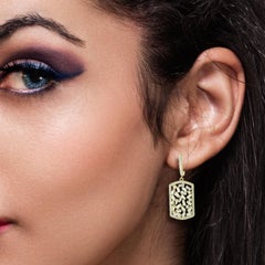 Boucles d'oreilles en or 18 carats et diamants