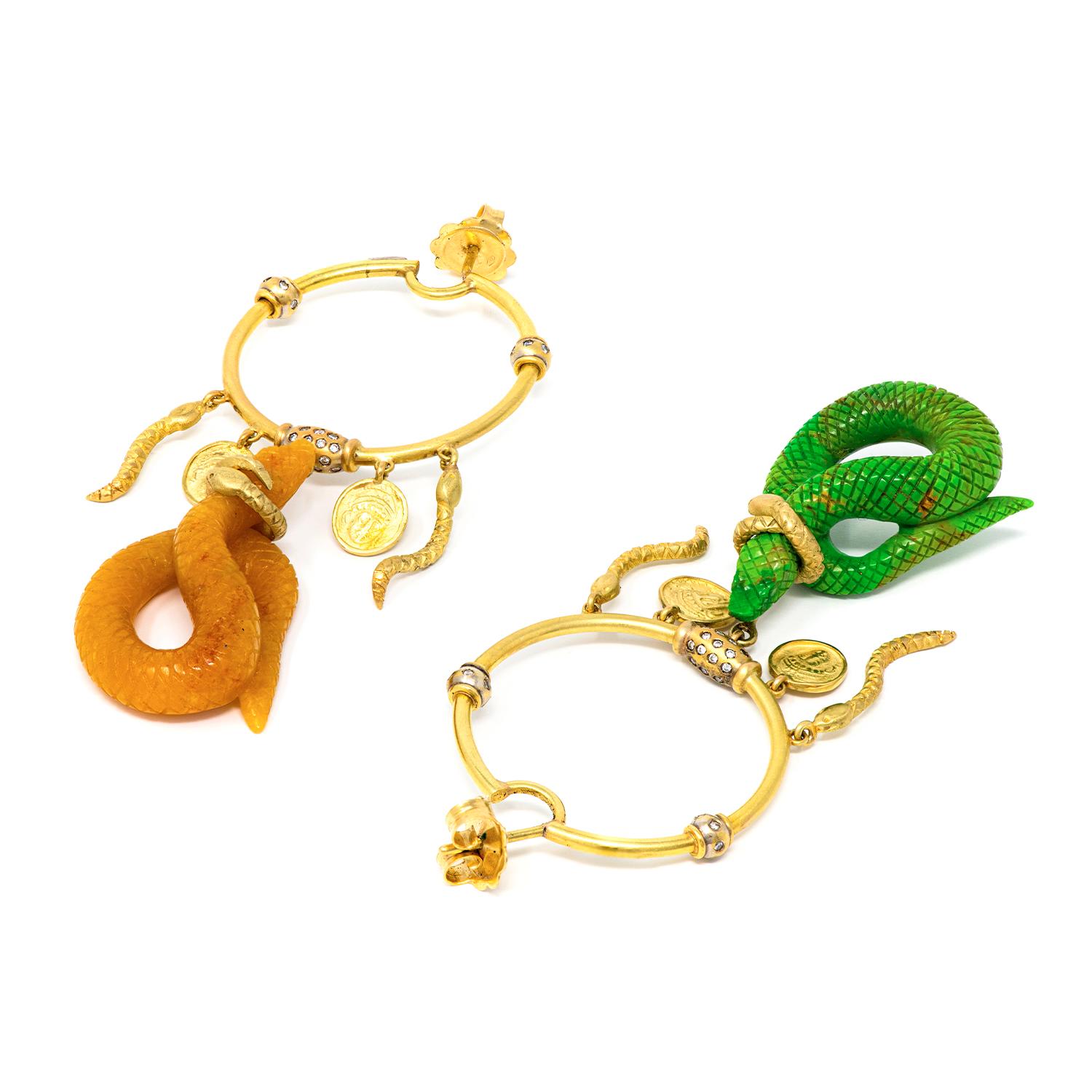 21st Century Diamond Serpent Snakes Green Turquoise Jade Coin Gold Hoop Earrings

Earrings in 18 Karat Yellow Gold, Diamonds and 2 serpents carved in Green Turquoise and Honey Jade.

Introducing our exquisite earrings from The Guardians of the