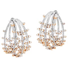 Orecchini a cerchio in oro 18k con diamante bianco