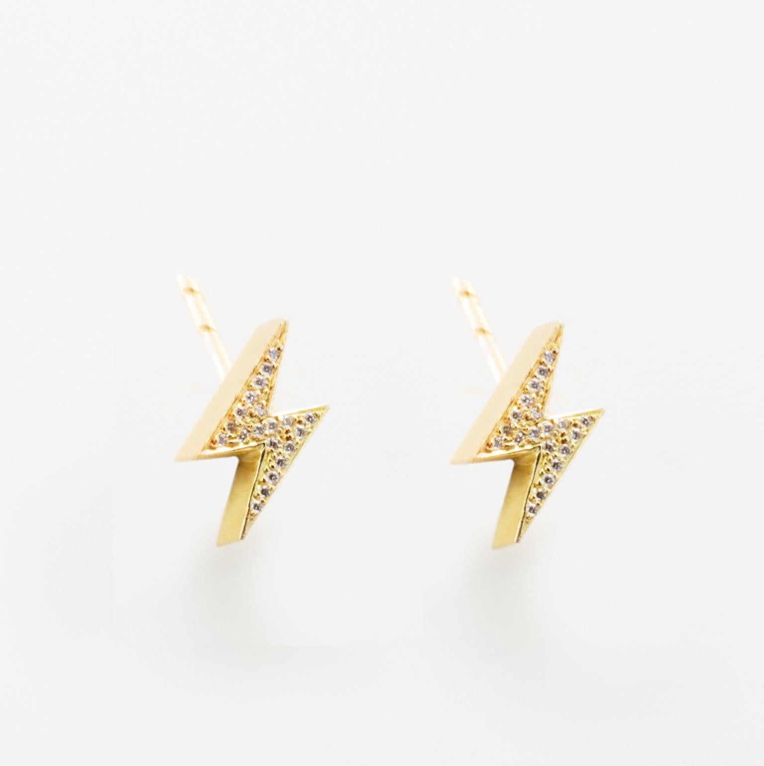 18k Yellow Gold Lightening Bolt Earrings feature two White Diamond pave Lightening Bolt earrings set in 18k yellow gold, with secure round earrings backs. 
Sold as a Pair
18k Yellow Gold, White Diamond Pave 
