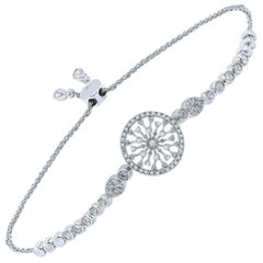 Bracelet flocons de neige ronds en or 18 carats et diamants