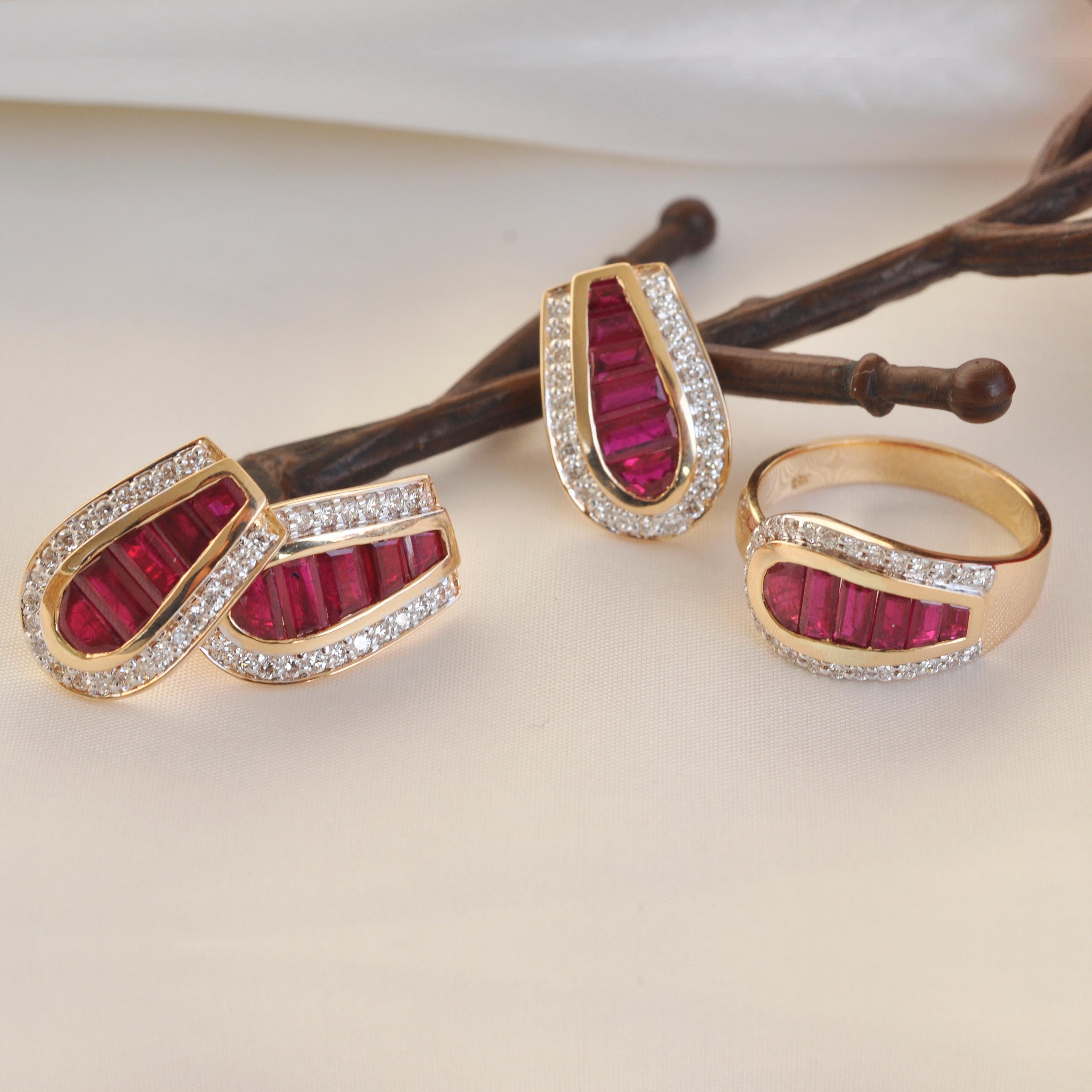 18 karat gold diamond burma ruby baguette pendant necklace earrings ring set.

Presenting a 18 karat gold art deco channel set ruby baguette diamond pendant necklace, earrings and ring. The burma ruby baguettes are meticulously handpicked after
