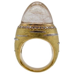 Anello a cupola in oro 18 carati con diamante e cristallo di rocca rutilato
