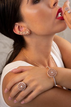 Bracelet jonc flocons de neige en or 14 carats et diamants