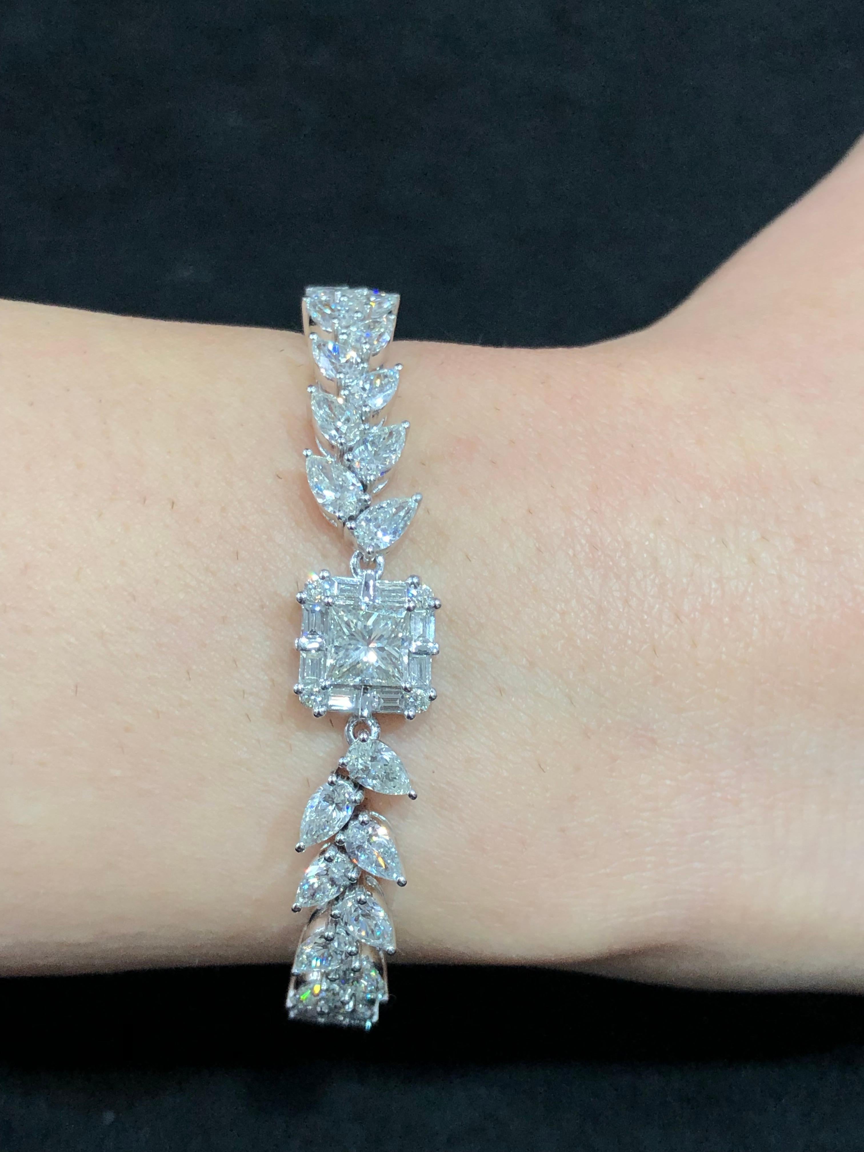 Diamond: 10.07 carat
18kt Gold: 20.906 grams
Ref No: DBR-CFC
Note: This piece is only available on order and can be made according to the wrist size 
Simplicity is the ultimate sophistication! Add this versatile diamond bracelet to your jewellery