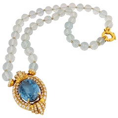 Collana in oro 18 carati con diamanti e topazio blu da 43,50 carati e perline di acquamarina