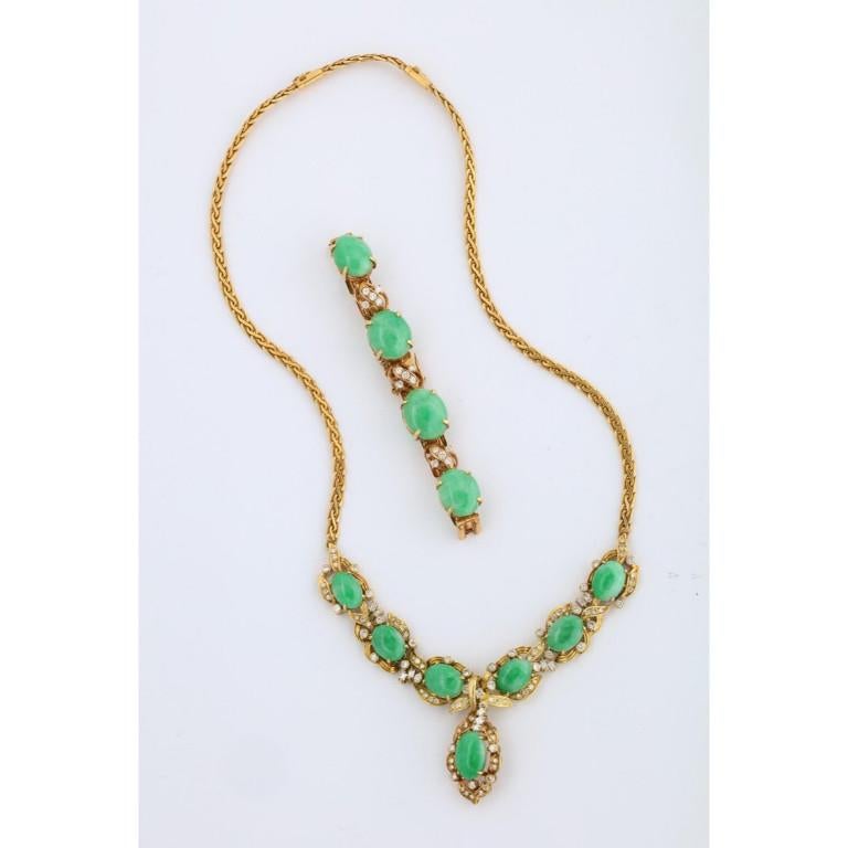 18-karat gold, diamonds, and Chinese jade necklace and bracelet set,  20th century  Inset with diamonds and cabochon jade.  Very good quality and elegant set.  Marked 750 for 18-karat gold.  Necklace (closed): 9