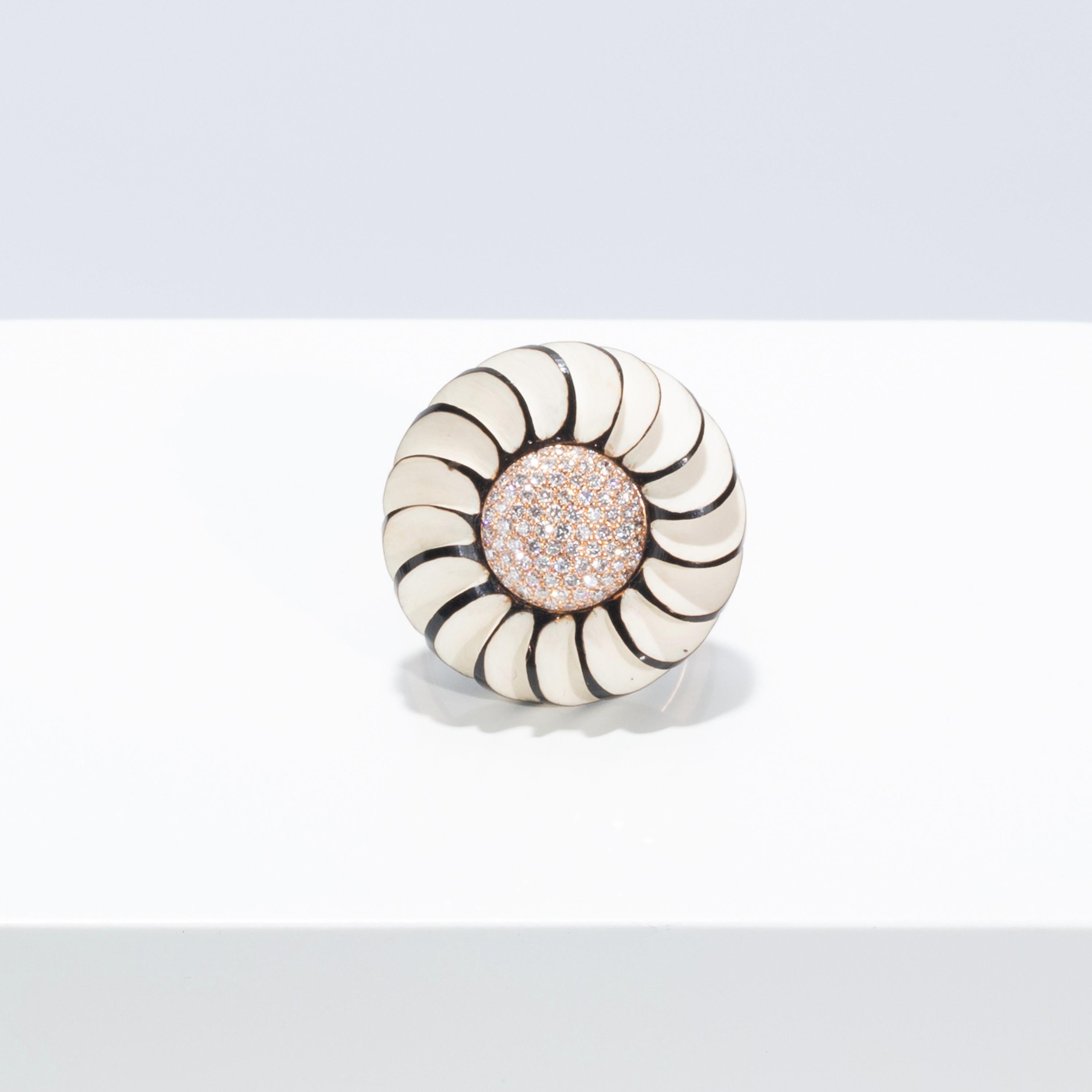 This one-of-a-kind ring is crafted from 18 Karat yellow gold (8 g), 0.45 carats of diamonds, and an Art Deco style black and cream celluloid button.

Ring size UK: M
Ring size EU: 52
Ring size US: 6.5


For many years, Francesca Villa was creative