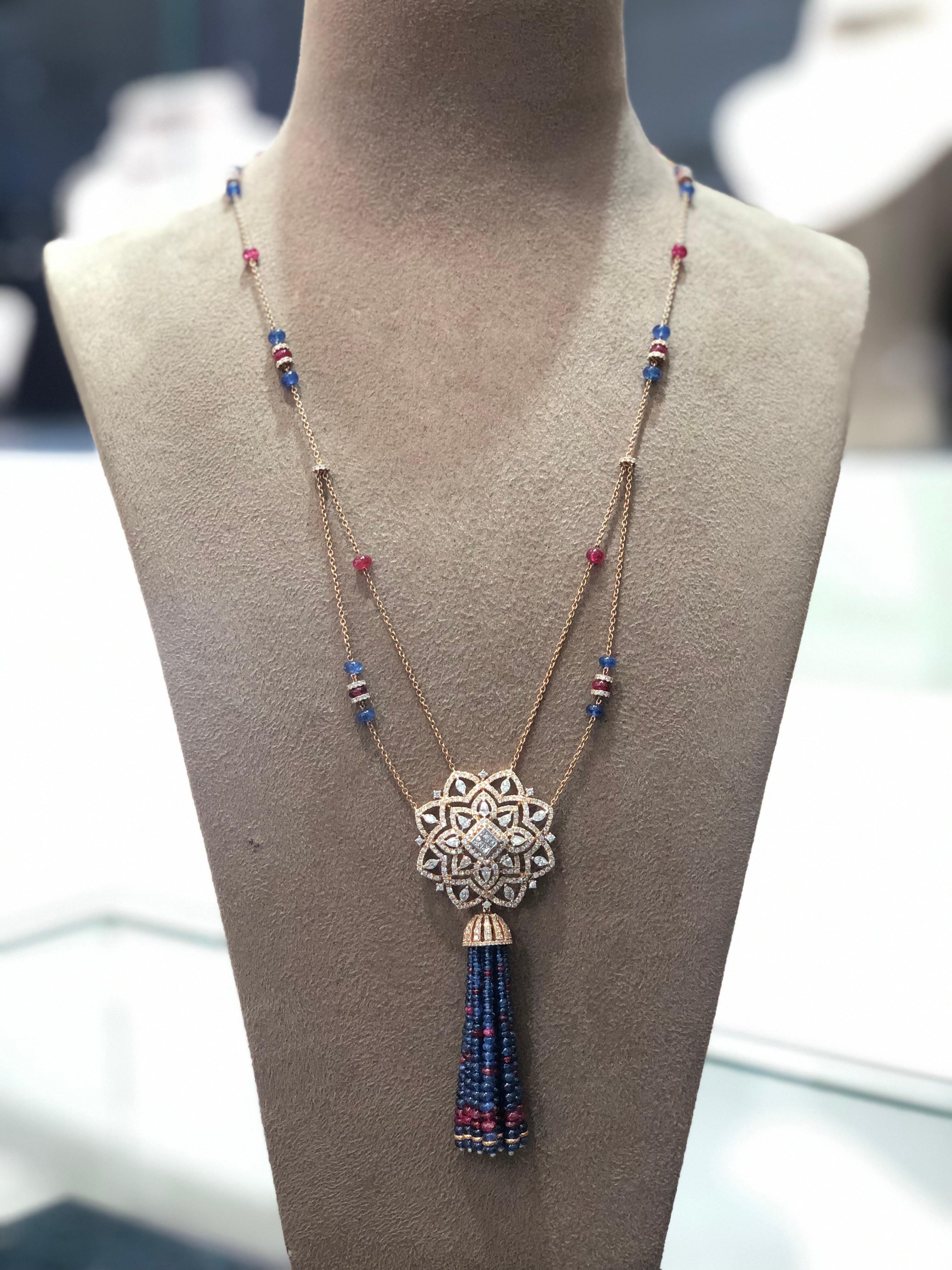 Diamonds: 5.38 carats
Sapphires: 20.69 carats
18kt Gold: 56.46 grams
Ref No: A@@

A beautiful and extraordinary diamond and twin colour tassel contemporary necklace which is perfect to wear over gowns.
