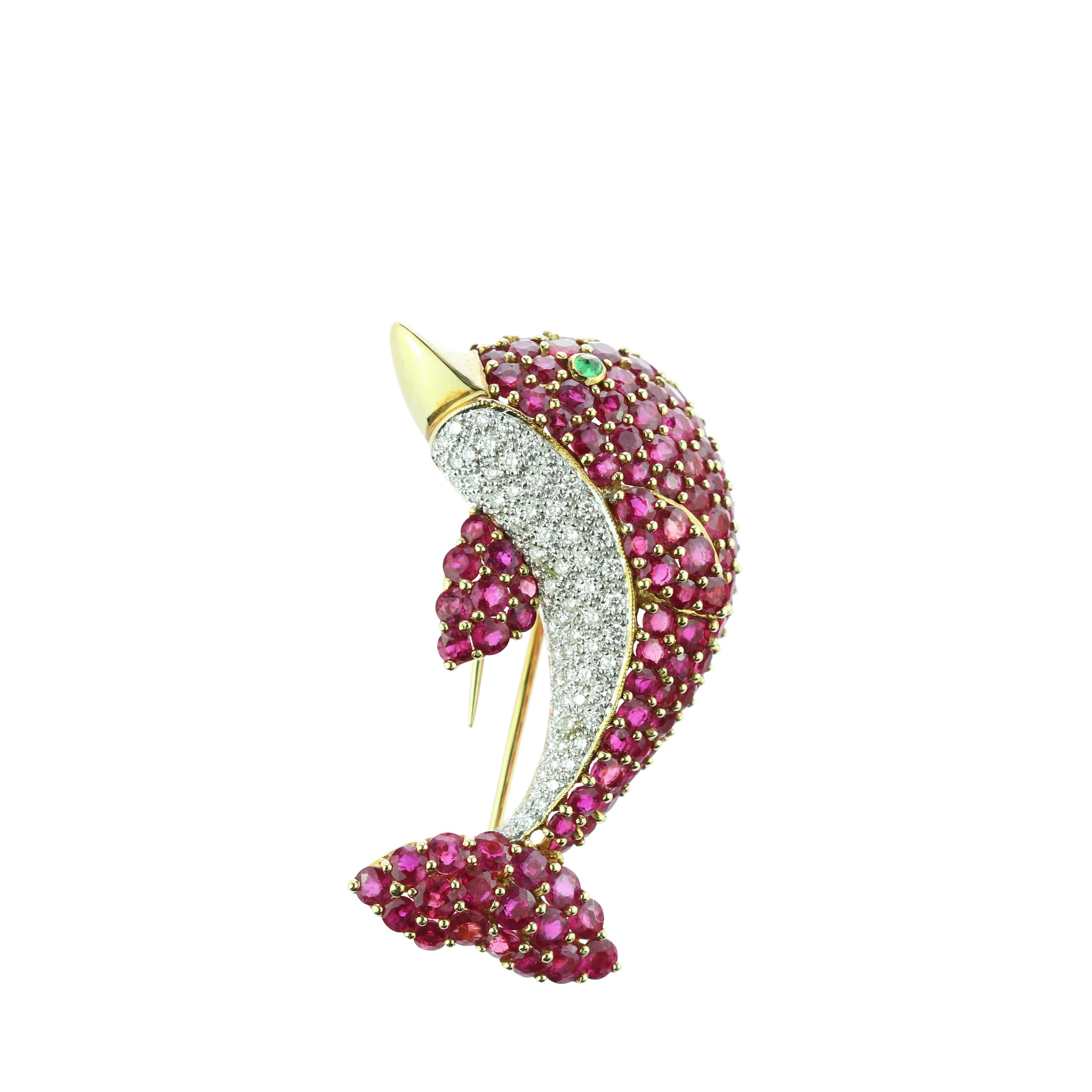 Colossal and extraordinary brooch modeled in the shape of a dolphin embellished with rubies, sapphires and diamonds.

Believe it or not pink dolphins do exist! This brooch is inspired by The Amazon river dolphin, also known as the pink river