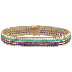 Diamanti Zaffiri Smeraldi Rubini Bracciale in oro 18K