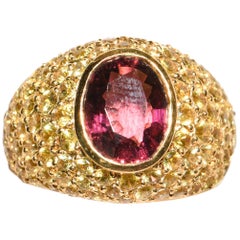 duchess of argyll engagement ring 18 Karat Gold Dome Ring with Oval Pink Tourmaline and Pave Yellow Sapphires