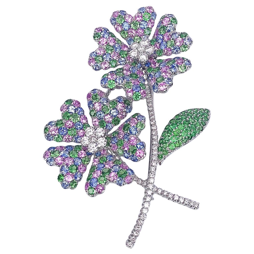 Broche double fleur en or 18 carats, diamants, saphirs pastel et tsavorites