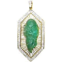18 Karat Gold Emerald and Diamond Pendant Containing 1 Hand Carved Emerald
