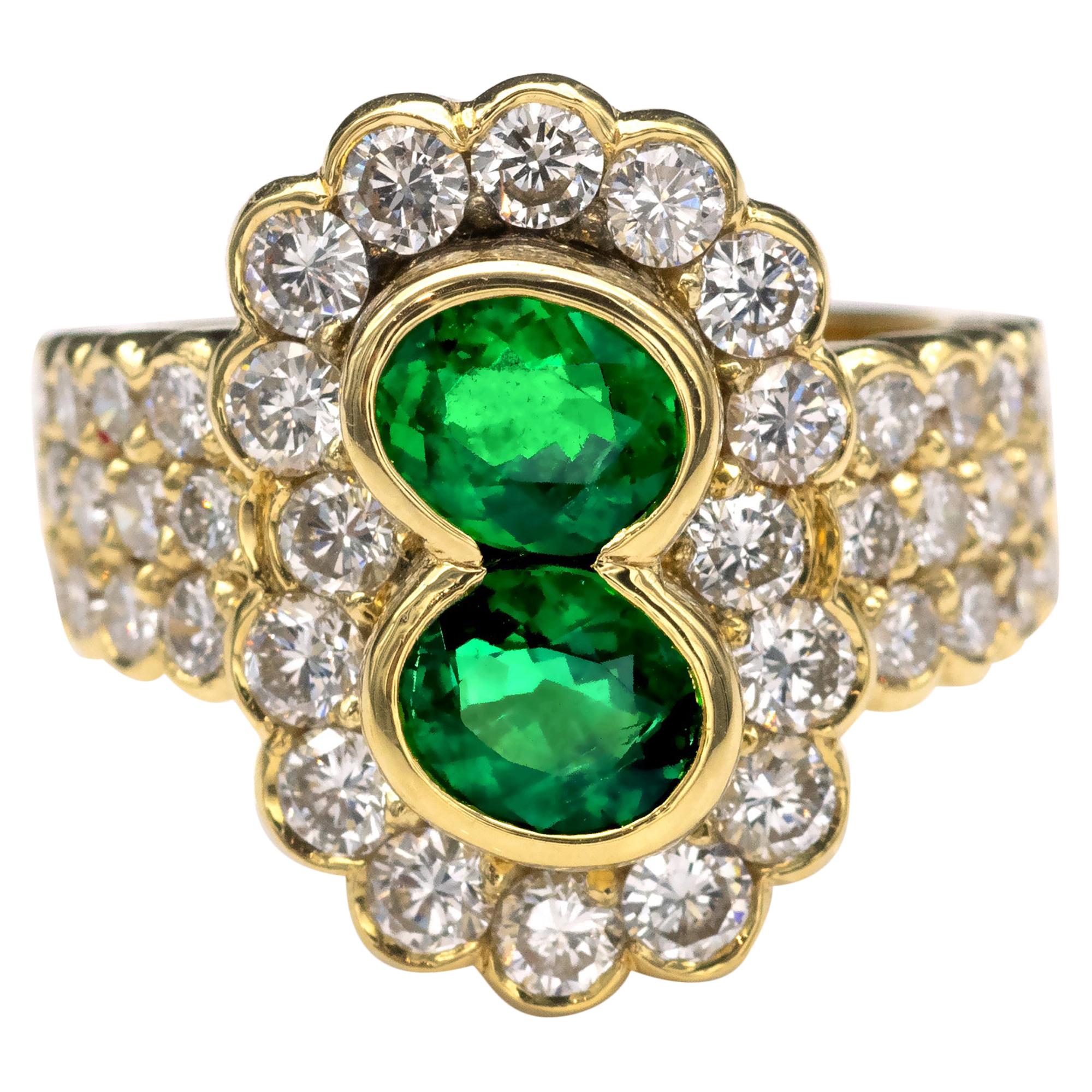 2 Oval Emeralds and Diamond 18-Karat Gold Halo Ring For Sale