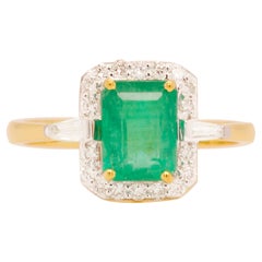 18 Karat Gold Emerald Cut Colombian Emerald Diamond Contemporary Ring