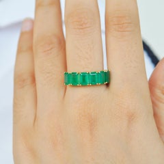 18 Karat Gold Emerald Cut Octagon Brazilian Emerald Half Eternity Band Ring