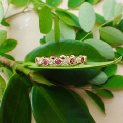 18 Karat Gold Eternity Band with 0.72 Carat of Ruby and 0.12 Carat of Diamond