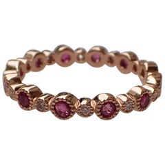 18 Karat Gold Eternity Band with 0.72 Carat of Ruby and 0.12 Carat of Diamond
