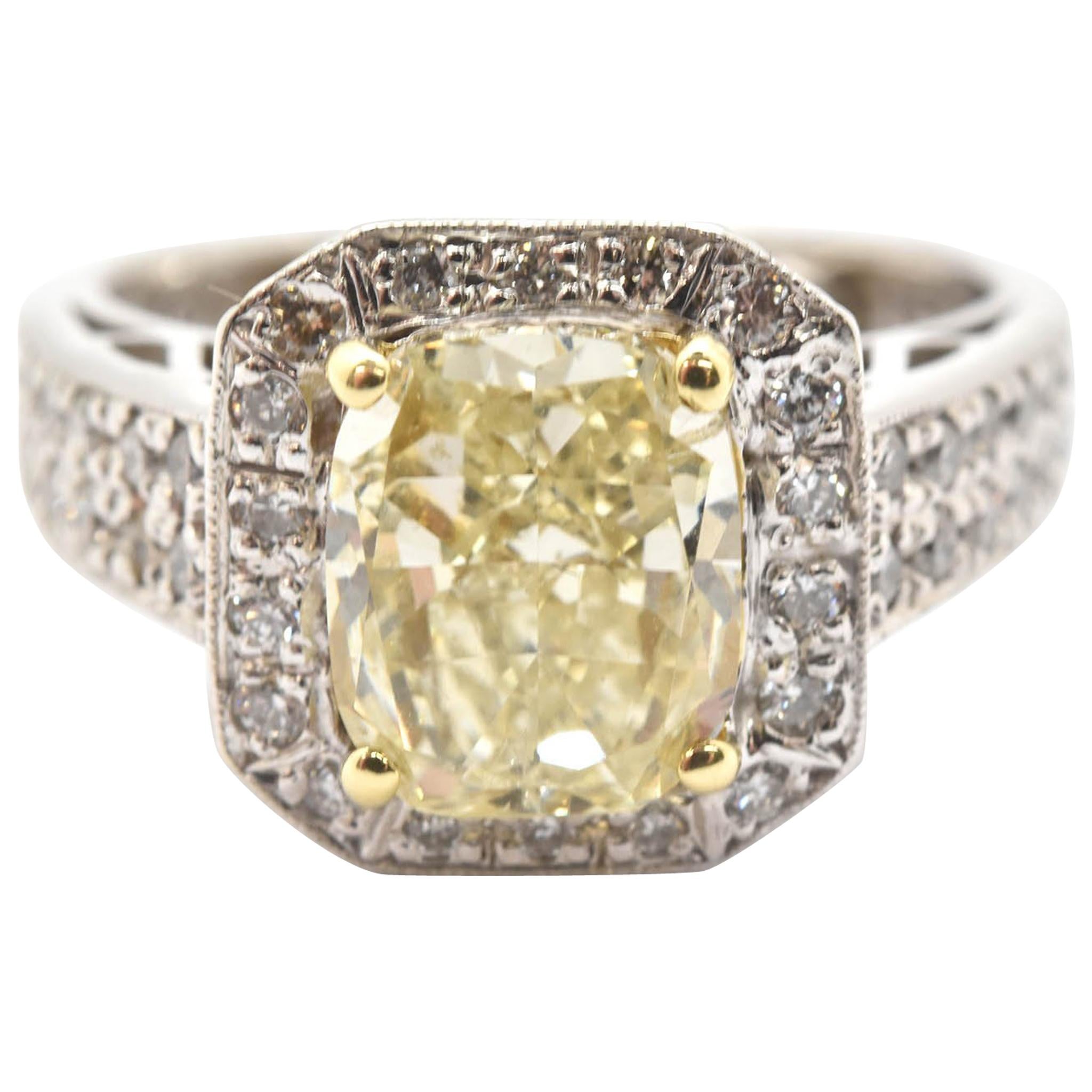18 Karat Gold Fancy Light Yellow 2.14 Carat Cushion Cut Diamond Engagement Ring