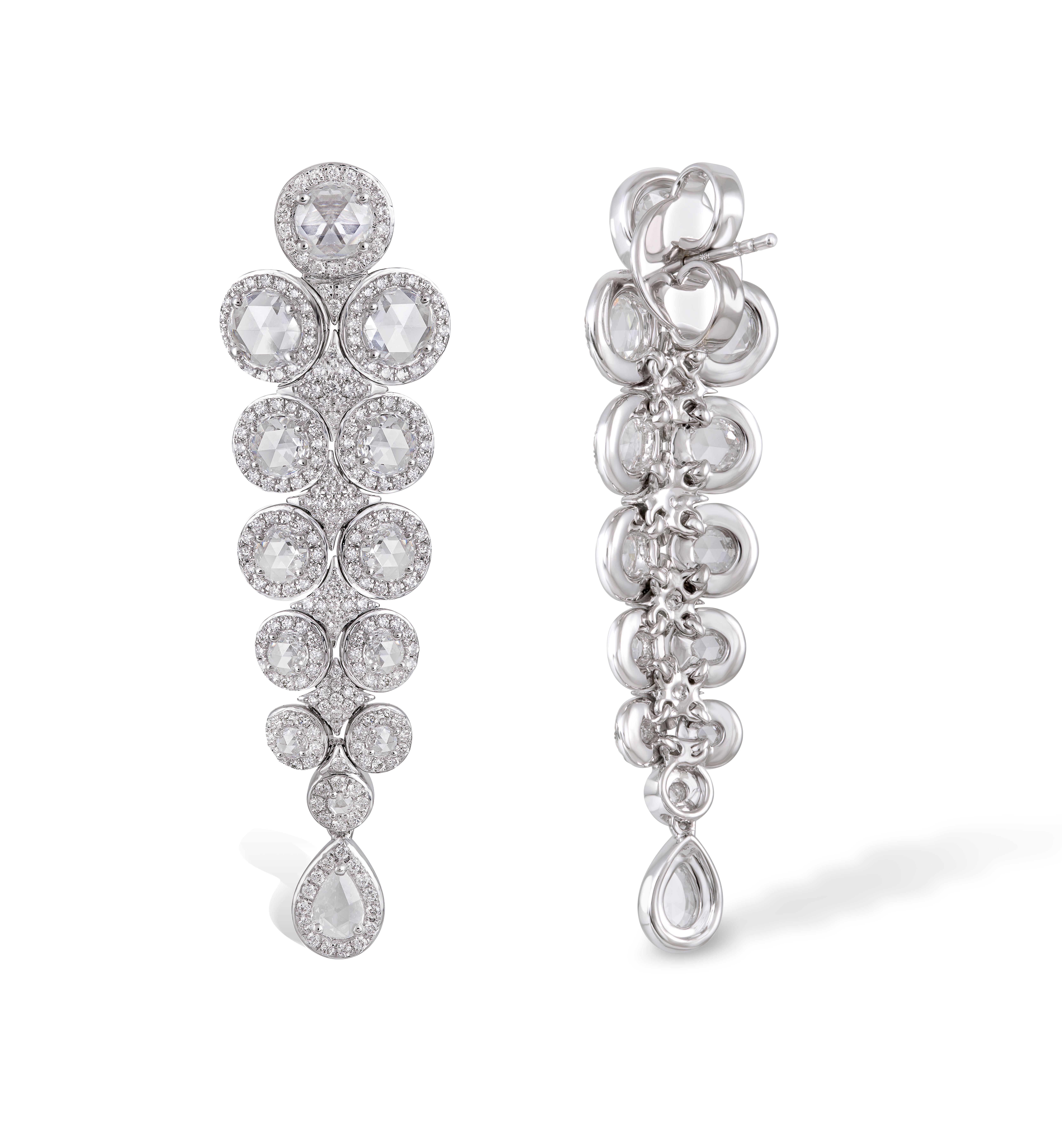 Like the trailing vines from which they take their name, these intricate earrings are unmistakably eye-catching. Embellished with 2.93cts of dazzling rose-cut diamonds, each one is painstakingly sourced to ensure they are perfectly matching. 

Total