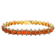 18 Karat Gold Fire Opal and Diamond Rivière Bracelet by Trudel, 1990s