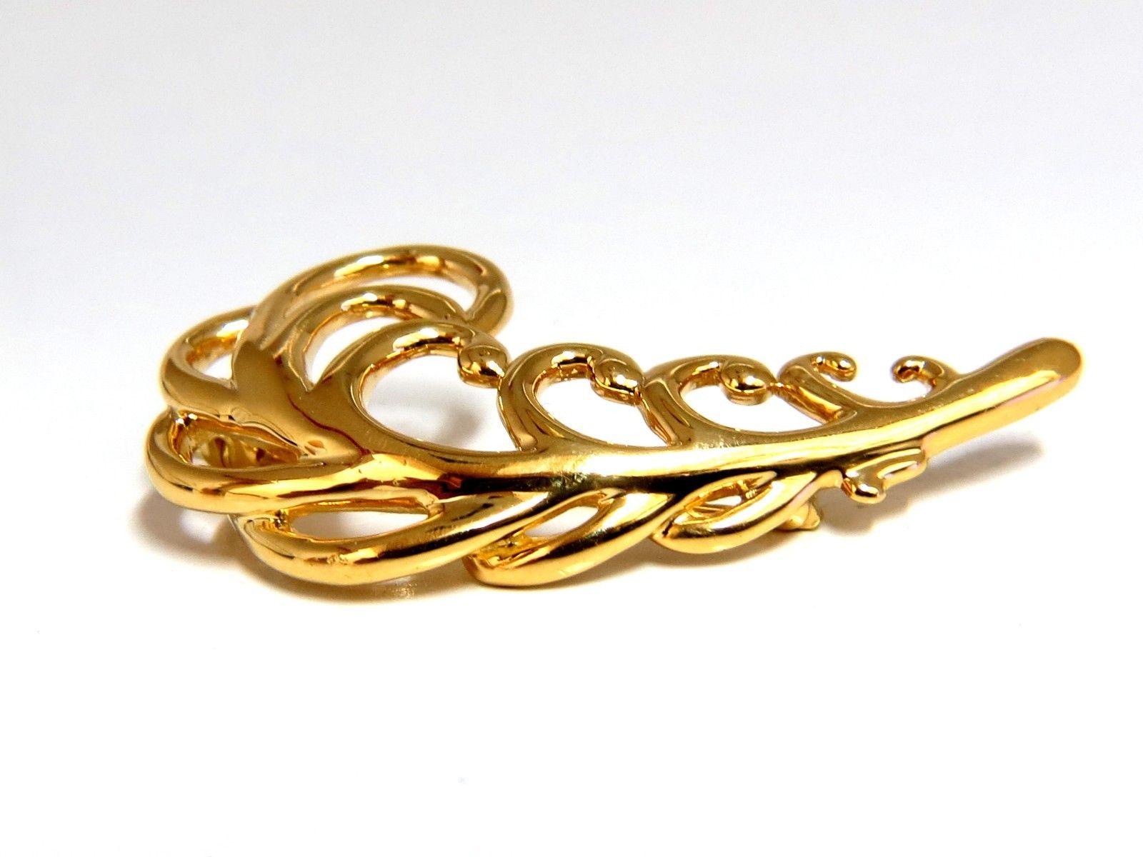 Designer Floral Brooch Pin

11.4 grams

18Kt. Yellow gold.

Overall:

48 x 25mm