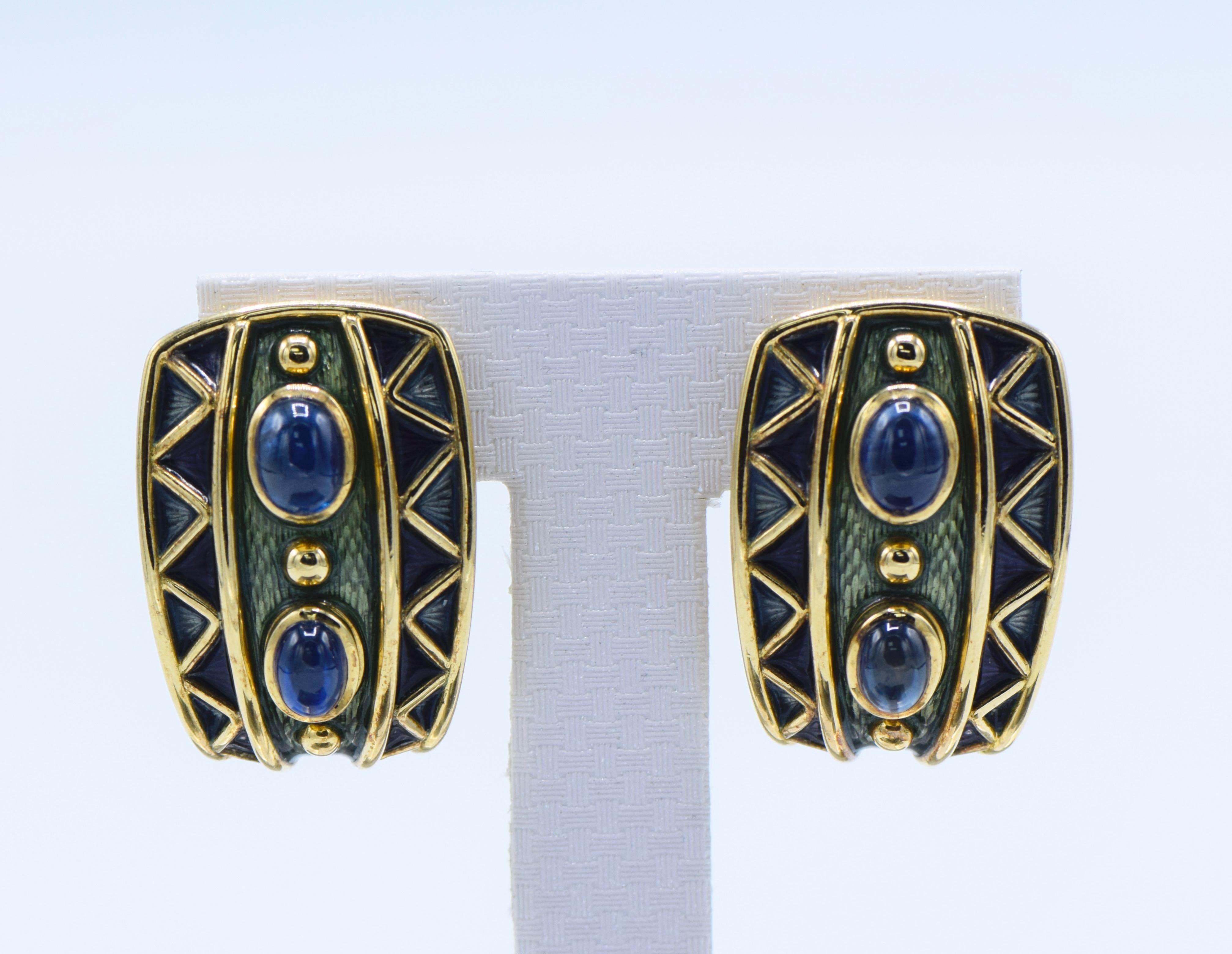 18 kt., 4 oval cabochon sapphires, with maker's mark & hallmarks, approximately 28.6 dwts. 
Sapphires: medium violetish-medium deep royal blue, slightly to moderately included, translucent, good polish. 

Posts and clip-backs. 1 1/4 x 7/8 inches. 