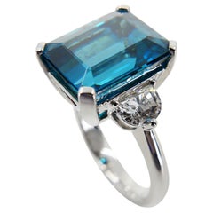 18 Karat Gold Gem Blue Zircon 11.27 Carat and Half Moon Diamonds 3-Stone Ring