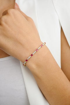 Bracciale di fidanzamento con diamanti e rubini in oro 18 carati per donna