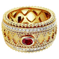 Bague en or 18 carats de style Granulata avec rubis ovale et diamants