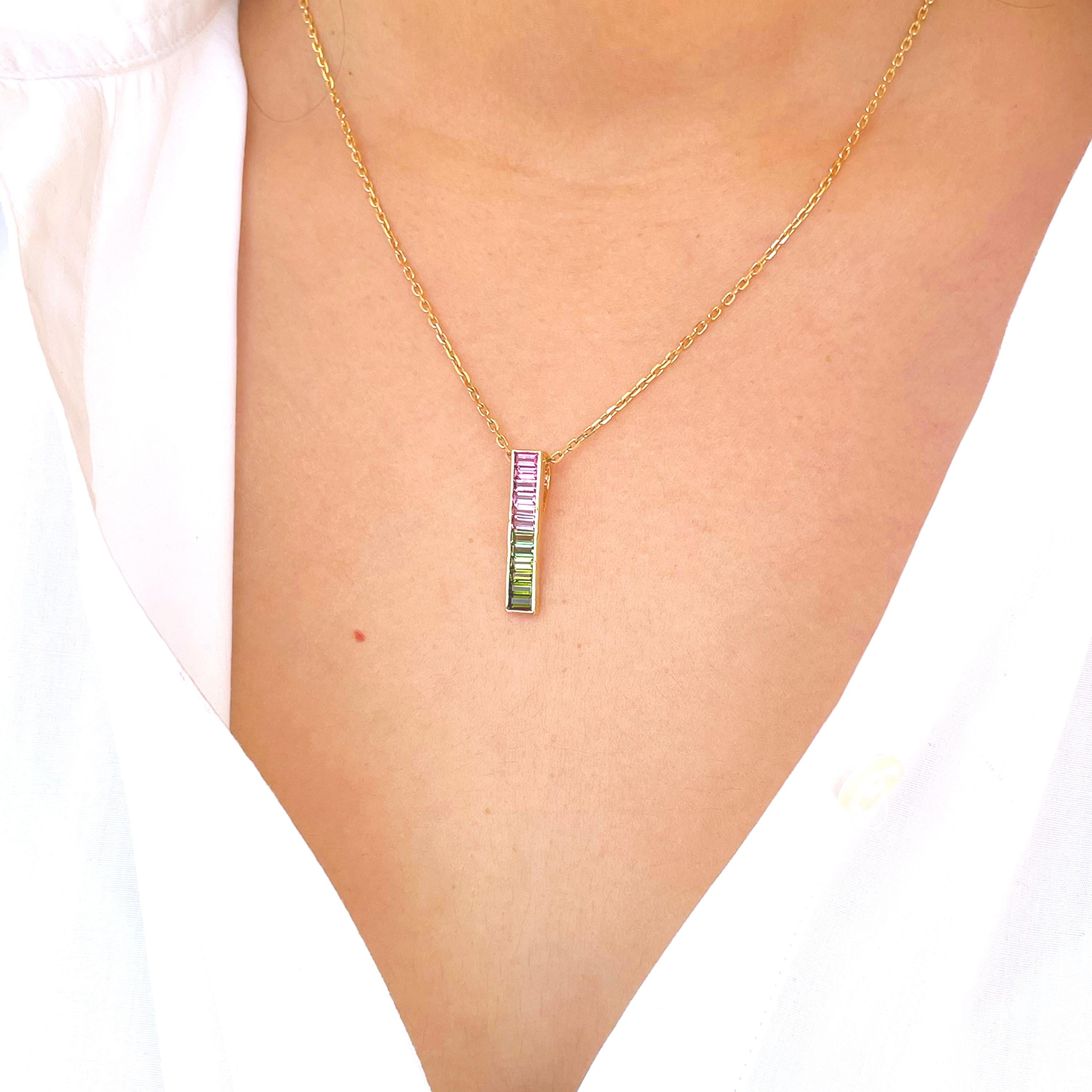 18 karat yellow gold green pink bi-tourmaline tourmaline linear watermelon bar pendant necklace.

Add something special to your jewellery box with the unique watermelon tourmaline bar pendant. Set in 18 karat gold, this classic linear design