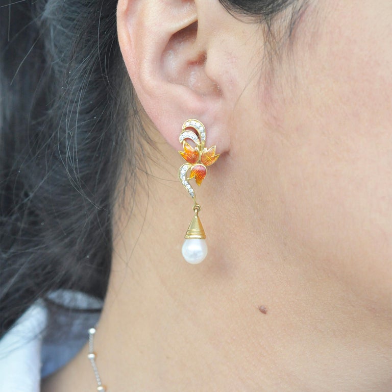 Amazing 18kt gold, enamel, and diamond dangle earrings  #jordanclinesjewelers #louisville…