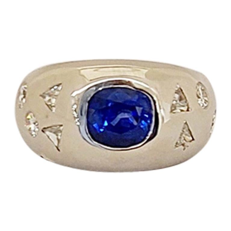 18 Karat WG Gypsy Ring with 1.82 Carat Sapphire and Fancy Shaped Diamonds For Sale